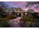 Brick ranch house with walkway at sunset at 4307 W Kensington Ave, Tampa, FL 33629