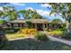 Brick ranch home with mature landscaping at 4307 W Kensington Ave, Tampa, FL 33629