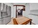 Kitchen features granite countertops, stainless steel appliances, and breakfast bar at 4307 W Kensington Ave, Tampa, FL 33629
