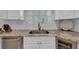 Modern kitchen with stainless steel appliances and granite countertops at 4307 W Kensington Ave, Tampa, FL 33629