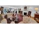 Spacious living room features hardwood floors, fireplace, and built-in shelving at 4307 W Kensington Ave, Tampa, FL 33629