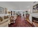 Bright living room with hardwood floors and comfortable seating at 4307 W Kensington Ave, Tampa, FL 33629
