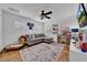 Playroom with sectional sofa and toy storage at 4307 W Kensington Ave, Tampa, FL 33629