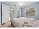 Bedroom with full bed, closet, and access to bathroom at 4606 Ridgecliff Dr, Brandon, FL 33511