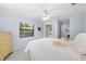 Bedroom with queen bed, dresser and access to bathroom at 4606 Ridgecliff Dr, Brandon, FL 33511