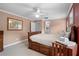 Cozy bedroom with a built-in dresser and ceiling fan at 4606 Ridgecliff Dr, Brandon, FL 33511