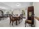 Formal dining room with a dark wood table and six chairs at 4606 Ridgecliff Dr, Brandon, FL 33511