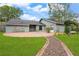 Ranch style home with stone accents and a brick walkway at 4606 Ridgecliff Dr, Brandon, FL 33511