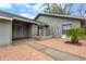 Front entrance of house with brick walkway and landscaping at 4606 Ridgecliff Dr, Brandon, FL 33511