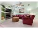 Spacious living room with a fireplace and large sectional sofa at 4606 Ridgecliff Dr, Brandon, FL 33511