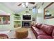 Living room boasts a fireplace and comfy seating at 4606 Ridgecliff Dr, Brandon, FL 33511