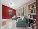 Home office with built-in bookcases and two armchairs at 4606 Ridgecliff Dr, Brandon, FL 33511
