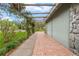 Brick walkway leading to the home with a pergola at 4606 Ridgecliff Dr, Brandon, FL 33511