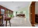 Sunroom features tile flooring and access to outdoor patio at 4606 Ridgecliff Dr, Brandon, FL 33511