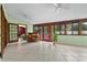Bright sunroom with tile floors and lots of windows at 4606 Ridgecliff Dr, Brandon, FL 33511