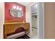 Wooden vanity with mirror and drawers, near closet at 4606 Ridgecliff Dr, Brandon, FL 33511