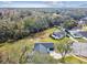 Aerial view showcasing the home's location on a spacious lot with surrounding landscape at 516 Highview N Cir, Brandon, FL 33510