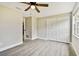 Large bedroom with double door closet and ceiling fan at 516 Highview N Cir, Brandon, FL 33510