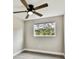 Bright bedroom with wood-look floors and ceiling fan at 516 Highview N Cir, Brandon, FL 33510