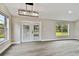 Spacious dining area with large windows and modern chandelier at 516 Highview N Cir, Brandon, FL 33510