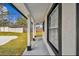 Covered porch with modern window and columns at 516 Highview N Cir, Brandon, FL 33510