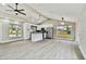 Spacious kitchen with white cabinets, stainless steel appliances, and an island at 516 Highview N Cir, Brandon, FL 33510