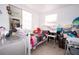 Charming bedroom with twin-size bed and adjacent closet at 5481 65Th N Ave, Pinellas Park, FL 33781