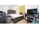 Cozy bedroom with full-size bed and workspace setup at 5481 65Th N Ave, Pinellas Park, FL 33781