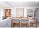 Small dining area with a wooden table and woven chairs at 5481 65Th N Ave, Pinellas Park, FL 33781