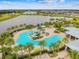 Relaxing pool with a waterslide and surrounding lounge area at 6321 Sunsail Pl, Apollo Beach, FL 33572