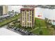 Aerial view of waterfront building, highlighting its location and amenities at 700 Island Way # 504, Clearwater, FL 33767