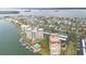 Wide aerial showcasing building location near water and tennis courts at 700 Island Way # 504, Clearwater, FL 33767