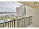 Private balcony overlooking the water, pool, and community at 700 Island Way # 504, Clearwater, FL 33767