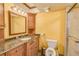 Bathroom with granite countertop vanity and shower at 700 Island Way # 504, Clearwater, FL 33767