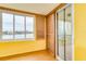 Bright bedroom with water views and access to balcony at 700 Island Way # 504, Clearwater, FL 33767