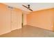 Spacious bedroom with light walls and ceiling fan at 700 Island Way # 504, Clearwater, FL 33767