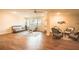 Relaxing clubhouse lounge with hardwood floors and wicker furniture at 700 Island Way # 504, Clearwater, FL 33767