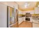 Modern kitchen with granite countertops and stainless steel appliances at 700 Island Way # 504, Clearwater, FL 33767