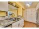Modern kitchen with granite countertops and stainless steel appliances at 700 Island Way # 504, Clearwater, FL 33767