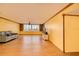 Bright living room with hardwood floors and large windows at 700 Island Way # 504, Clearwater, FL 33767