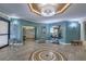 Elegant lobby with seating area and mosaic tile floor at 700 Island Way # 504, Clearwater, FL 33767