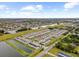 Aerial view showcasing community and water features at 7014 Summer Holly Pl, Riverview, FL 33578