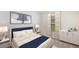 Spacious bedroom with neutral color palette and plenty of natural light at 7812 Wheat Stone Dr, Zephyrhills, FL 33540