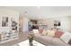 Spacious living room with ample natural light and a neutral color palette at 7812 Wheat Stone Dr, Zephyrhills, FL 33540
