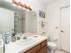 Clean bathroom with single vanity, shower, and toilet at 7312 7Th Nw Ave, Bradenton, FL 34209