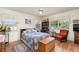 Bright bedroom with a queen bed and hardwood floors at 7312 7Th Nw Ave, Bradenton, FL 34209