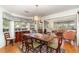 Formal dining room with hardwood floors and large windows at 7312 7Th Nw Ave, Bradenton, FL 34209