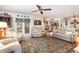 Relaxing living room with comfy sofas and a ceiling fan at 7312 7Th Nw Ave, Bradenton, FL 34209