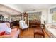Bright living room with hardwood floors and a piano at 7312 7Th Nw Ave, Bradenton, FL 34209