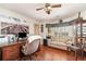 Home office with built-in desk and hardwood floors at 7312 7Th Nw Ave, Bradenton, FL 34209